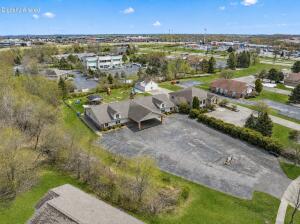 1701  Vogt Dr in West Bend wi. List Price: $1,299,000